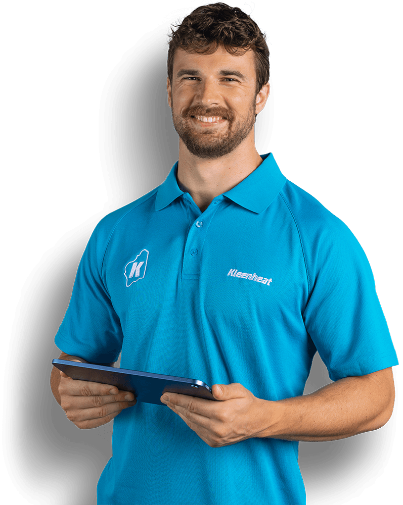 Kleenheat team member wearing a cyan blue shirt, smiling while holding a tablet device